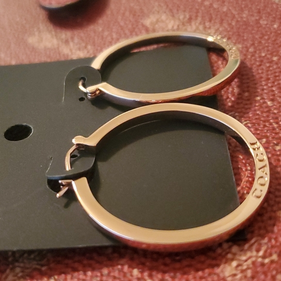 COACH ROSEGOLD MEDIUM THICK HOOP EARRINGS WITH COACH ETCHED IN THEM ON BOTH SIDE - Picture 2 of 3